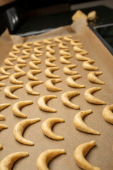 unbaked christmas cookies on baking sheet 