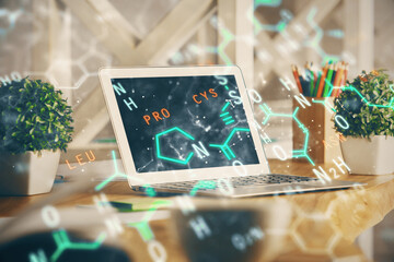 Desktop computer background and formula hologram writing. Double exposure. Education concept.