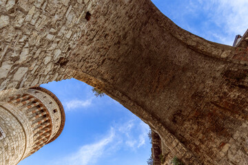 Arch of the main entrance bridge to the castle of Brescia, Lombardy, Italy