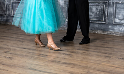 beautiful female dancer legs in golden dance shoes