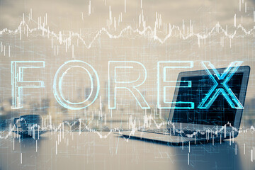 Double exposure of forex graph and work space with computer. Concept of international online trading.