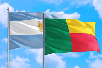 Benin and Argentina national flag waving in the windy deep blue sky. Diplomacy and international relations concept.