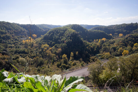 Landscape of mountain of tufa, overlooking the green Treja river valley, in Lazio region.Italy.Photography near Strada Provinciale 17b road.