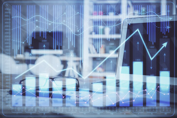 Double exposure of forex chart and work space with computer. Concept of international online trading.