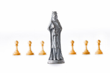 Сhess as an abstract concept. Beautiful antique chess set on white background.