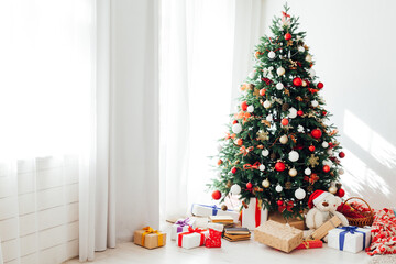 Christmas tree with gifts decor garland new year interior