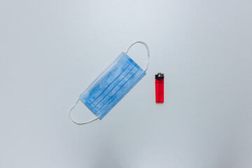 Top view of surgical mask with lighter