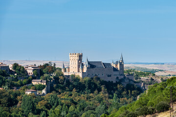 Fototapeta na wymiar Aerial view of the Alcazar, a stone castle-palace located in the walled old city of Segovia, Spain.