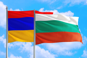 Bulgaria and Armenia national flag waving in the windy deep blue sky. Diplomacy and international relations concept.