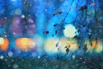 abstract snow blurred background city lights, winter holiday new year