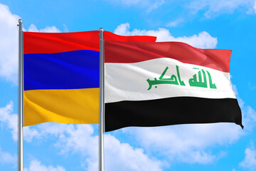 Naklejka na ściany i meble Iraq and Armenia national flag waving in the windy deep blue sky. Diplomacy and international relations concept.