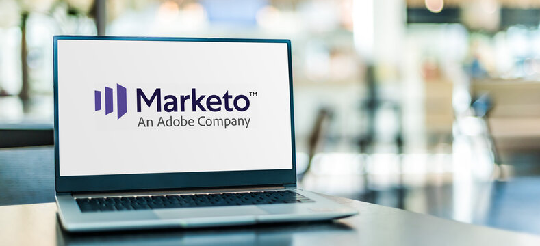 Laptop computer displaying logo of Marketo