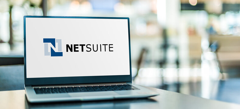 Laptop computer displaying logo of NetSuite