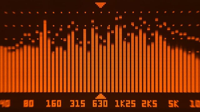 The professional concert equalizer has a yellow spectrum analyzer on the display that analyzes the frequency range of music or any sound and can change it. Closeup