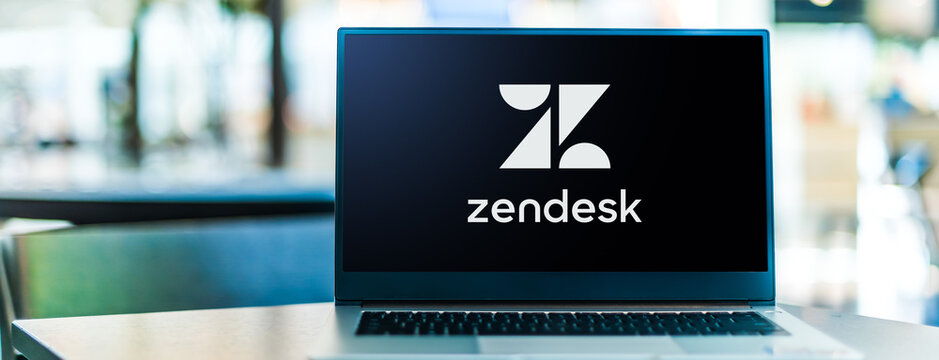Laptop computer displaying logo of Zendesk