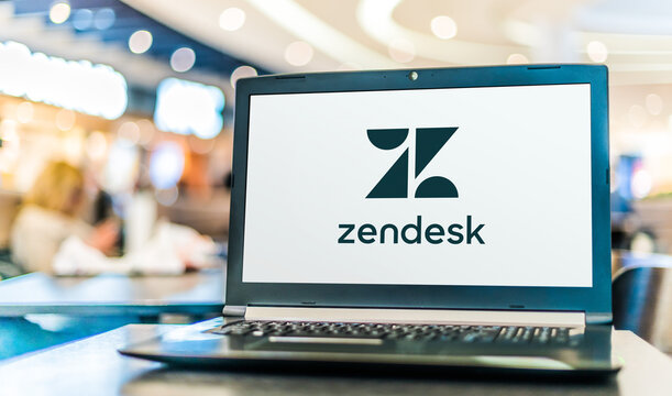 Laptop computer displaying logo of Zendesk