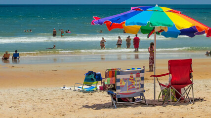 Relaxing day with the umbrellas and beach chairs at Flagler Beach, Florida.