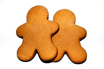 Two gingerbread men on a white background