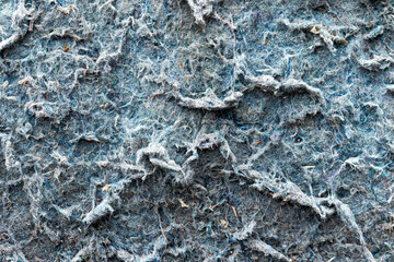 Close up view. Rag mop for cleaning floors with the old threadbare and dirty.