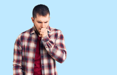 Young handsome man wearing casual shirt feeling unwell and coughing as symptom for cold or bronchitis. health care concept.