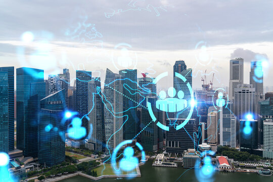 Social media icons hologram over panorama city view of Singapore, Asia. The concept of people networking and connections. Double exposure.