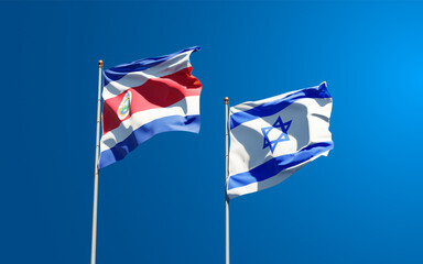 Beautiful national state flags of Israel and Costa Rica together at the sky background. 3D artwork concept.