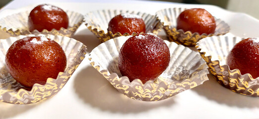 Indian Sweet Gulab Jamun is a Syrupy Dessert Popular in India
