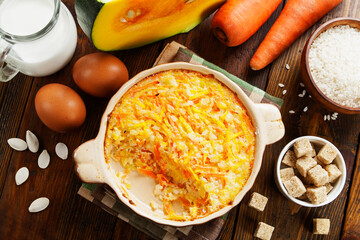 Pumpkin casserole with carrots and rice - 391033369