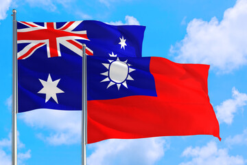 Taiwan and Australia national flag waving in the windy deep blue sky. Diplomacy and international relations concept.