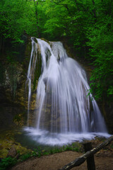 Fototapeta premium Beautiful waterfall in the forest. Jur-jur in Crimea.
