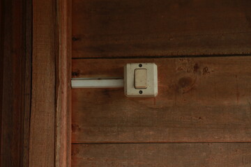 old wooden door with the switch 