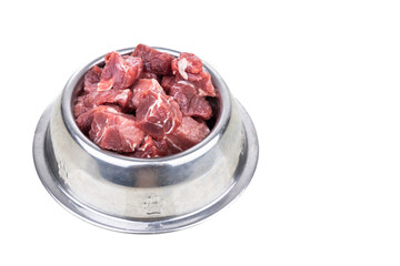 Serving of raw barf beef meat chunk for dog meal