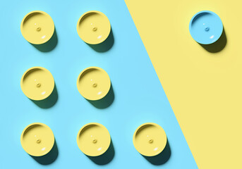 Abstract colorful mock up scene with yellow cylinders on blue and yellow background; several rows of round pills on two-tone backdrop; mini circle pattern; simple geometric surface; 3d rendering