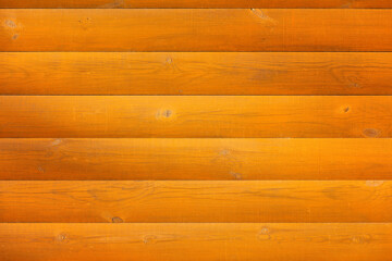 Brown surface of a wooden wall made of horizontal semicircular boards