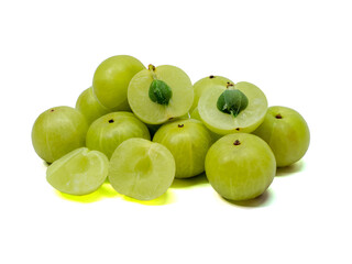 pile of Indian gooseberry ,Phyllanthus emblica , amla green fruits isolated on white background. This has clipping path.