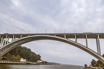 Arrabida Bridge - arch bridge of reinforced concrete over the Douro River, between Porto and Vila Nova de Gaia. Porto, Portugal.