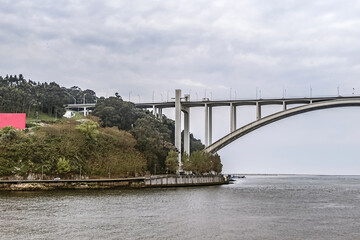 Arrabida Bridge - arch bridge of reinforced concrete over the Douro River, between Porto and Vila Nova de Gaia. Porto, Portugal.