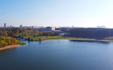 Fototapeta premium Top view of the city lake near the summer park