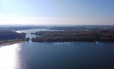 Top view of the city lake near the summer park