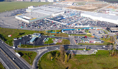 Top view of a huge parking lot near the shopping center
