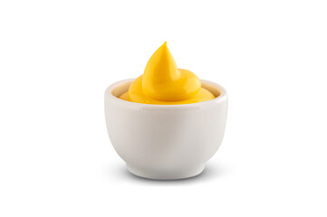 Ceramic gravy boat with cheese sauce on a white background