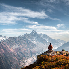 Amazing view on Monte Bianco mountains range with tourist on a foreground. Vallon de Berard Nature...
