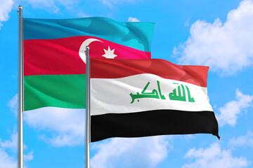 Naklejka na ściany i meble Iraq and Azerbaijan national flag waving in the windy deep blue sky. Diplomacy and international relations concept.