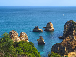 The beauty of Portugal - hiking in Lagos at the blue Atlantic ocean in Portugal