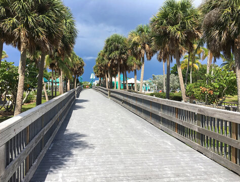 Boardwalk to the beach at Bowditch Point Regional Park.   Bowditch is located at the northern tip of Estero Island on Fort Myers Beach, Florida, USA.