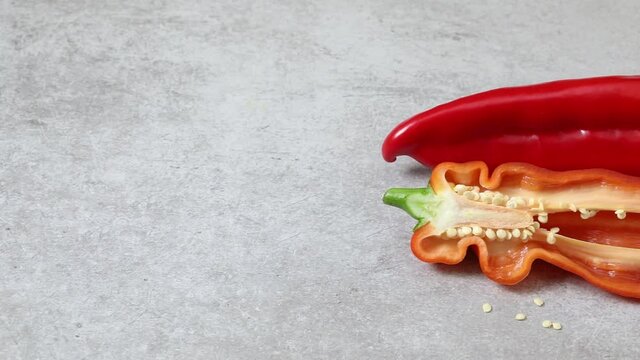  Sliced fresh red pointed bell pepper with seeds close up