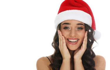 Beautiful woman in Santa hat on white background. Christmas party