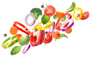 Set of different fresh vegetables and spices falling on white background
