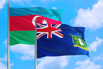 Fototapeta premium British Virgin Islands and Azerbaijan national flag waving in the windy deep blue sky. Diplomacy and international relations concept.