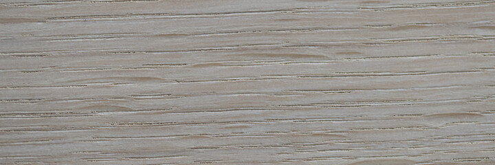 Gray abstract background from wood with scuffs closeup. Woodwork concept